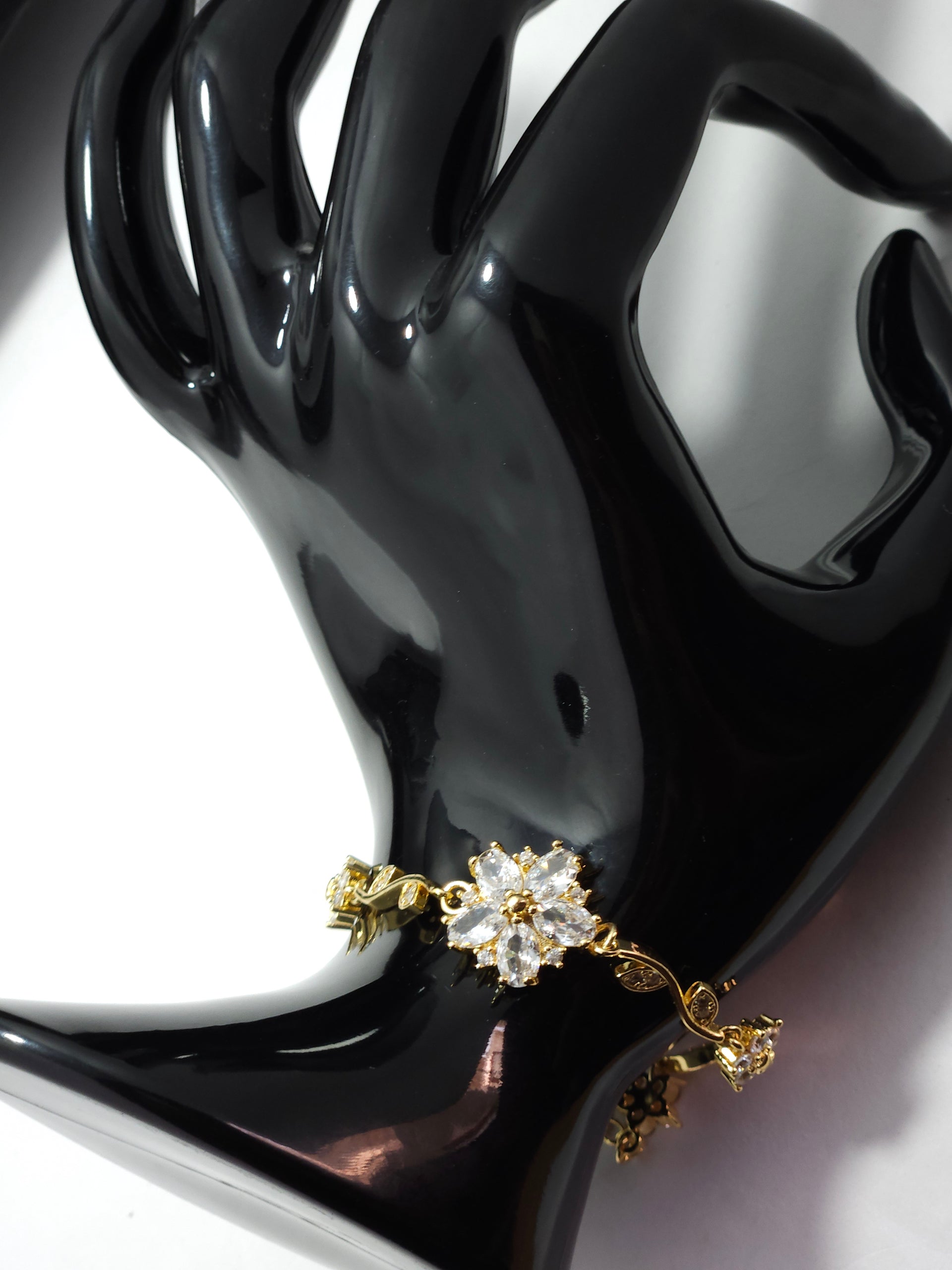 Floral Crystal Charm Bracelet – Gold-Tone Elegant Designer Bracelet